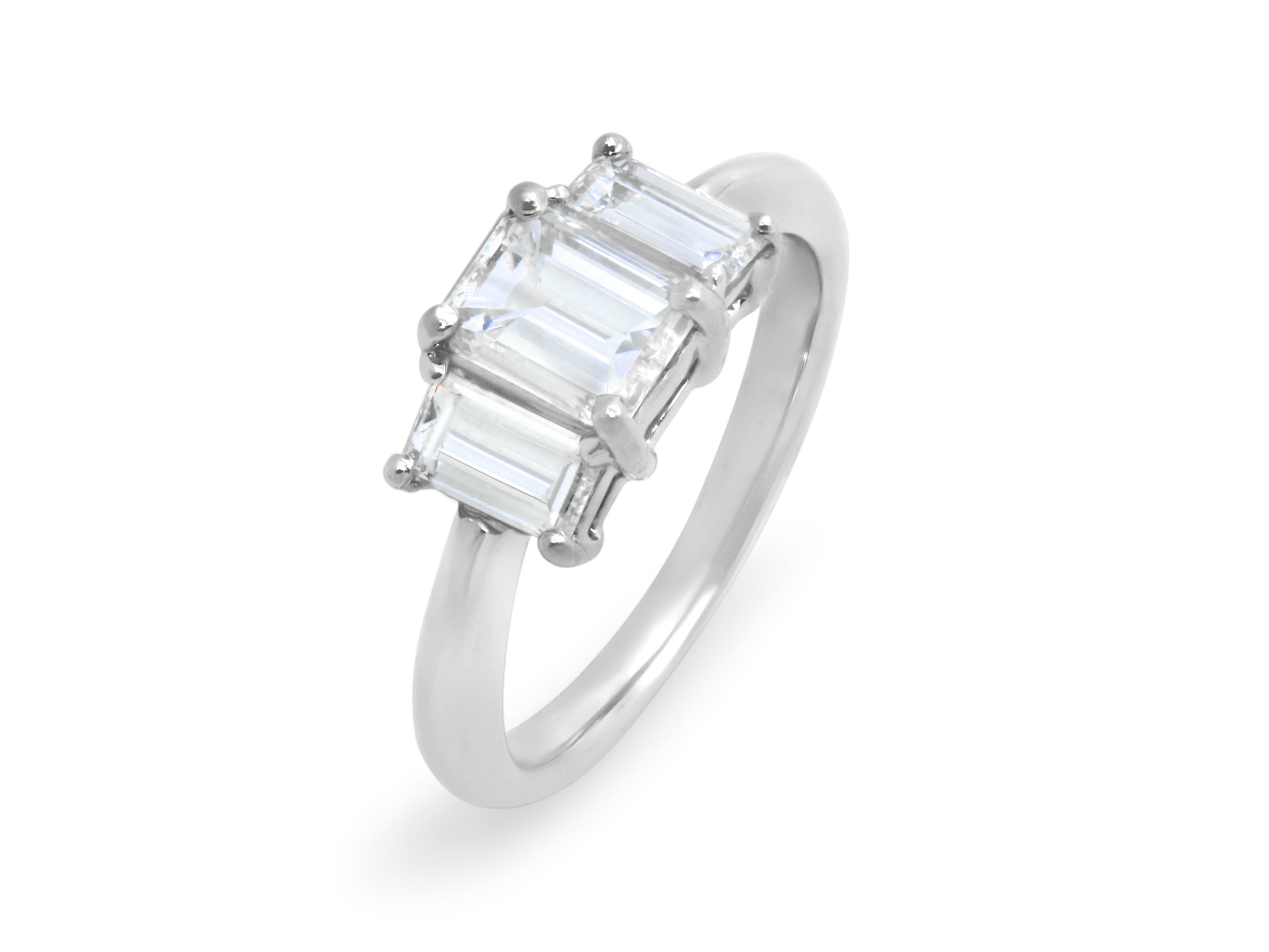 Emerald Cut Three-Stone Diamond Ring in Platinum
