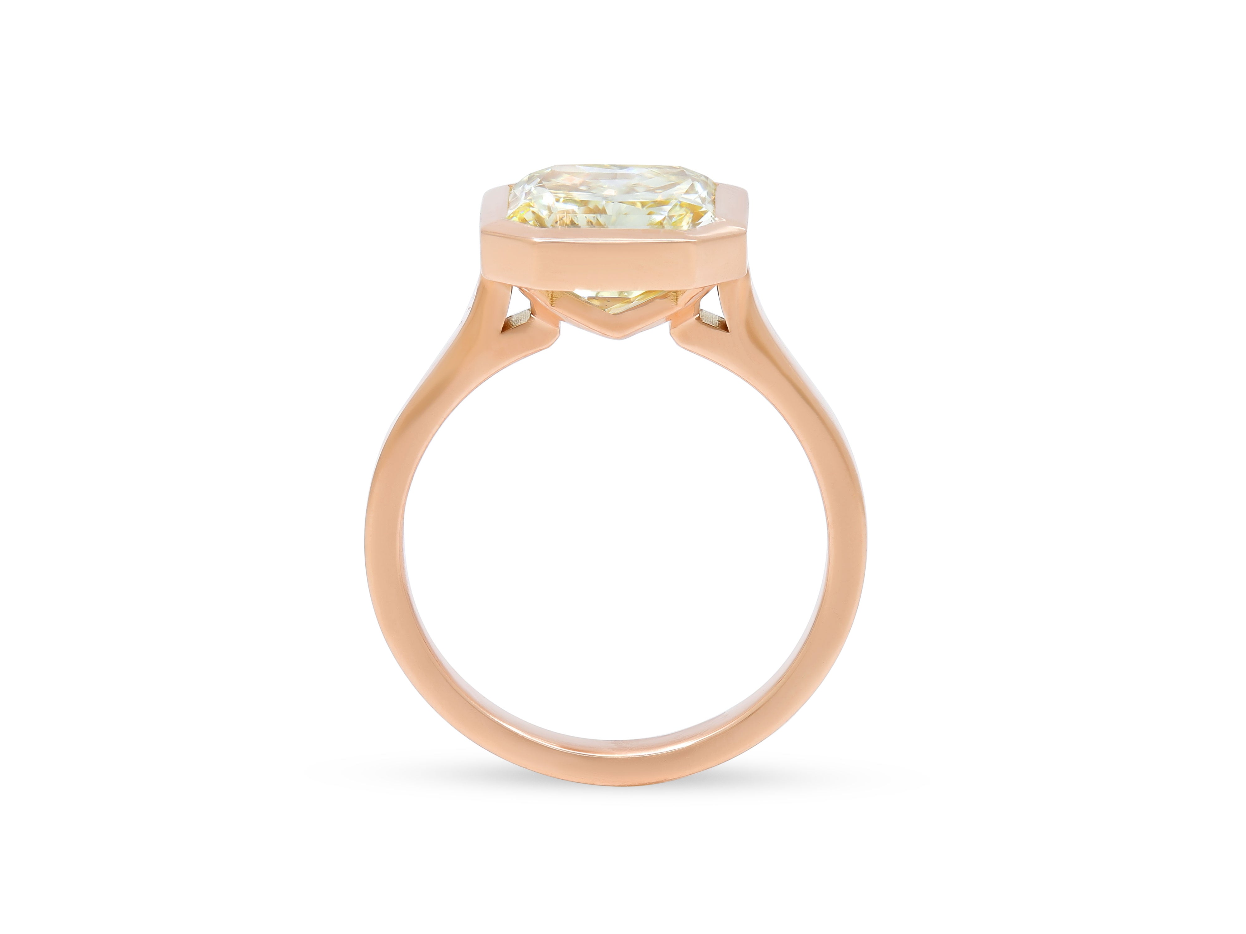 Fancy Yellow Radiant Cut Diamond, 4.61 carats, Bezel-Set Ring in 16K Kazanjian Red Gold