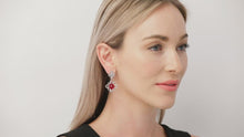 Load and play video in Gallery viewer, Kazanjian Cabochon Burma Ruby Earrings in Platinum &amp; 18K White Gold
